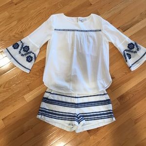 Lightly worn blue and white blouse